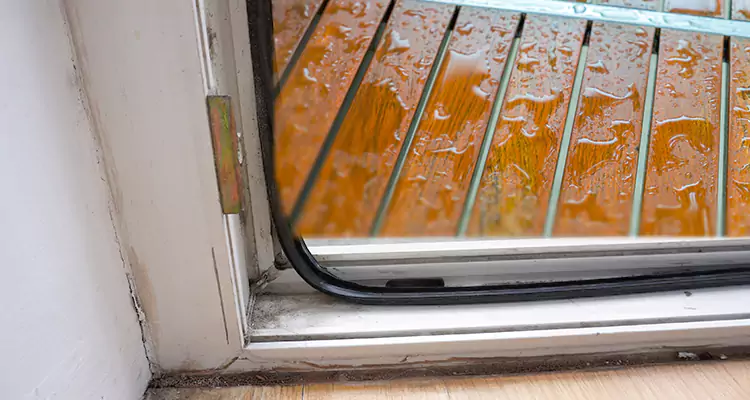 Water Leaking Wooden Patio Doors Repair in Warrington, FL